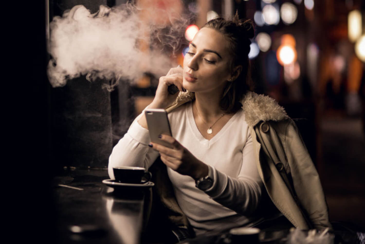 woman smokes weed pen 